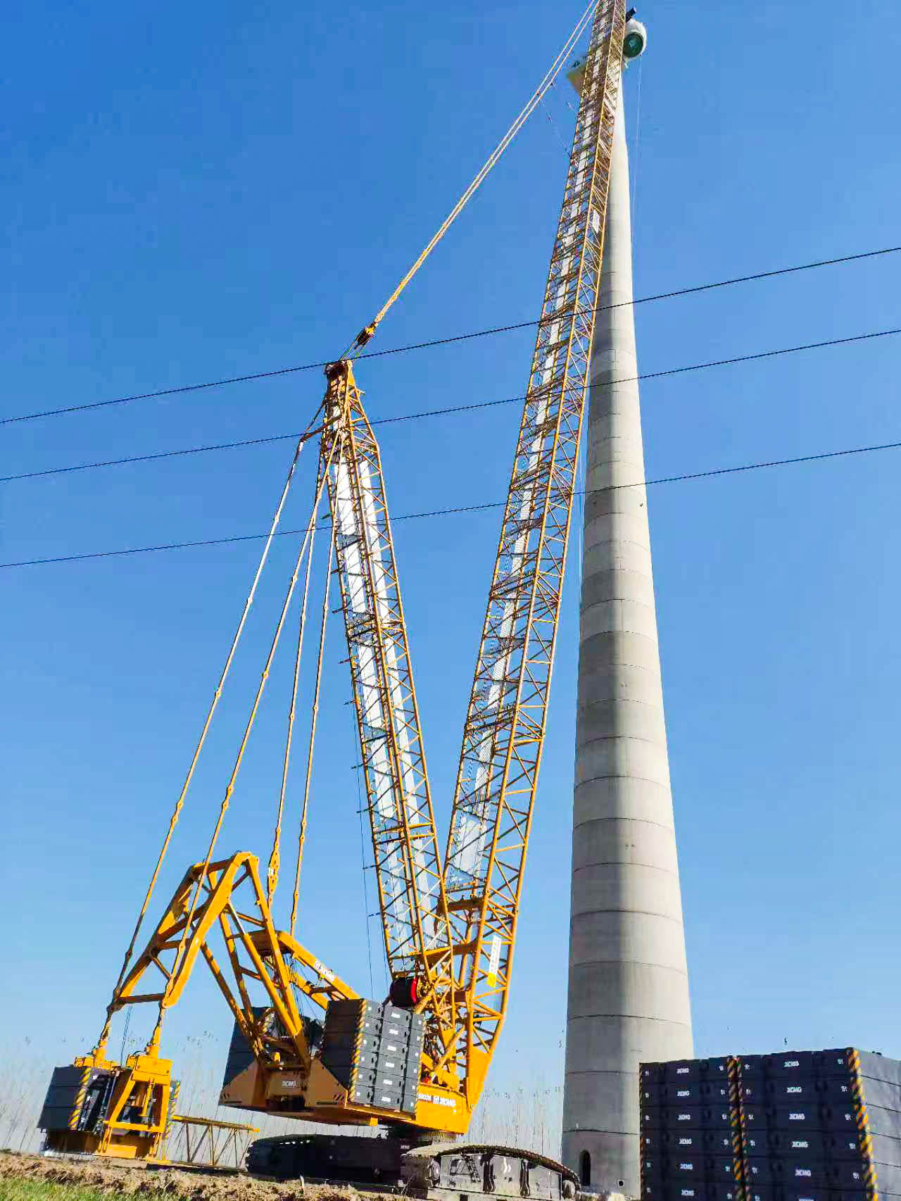 160米高空精准“搭积木”：乐鱼体育XLC15000M分体吊装6.25兆瓦风机全纪录